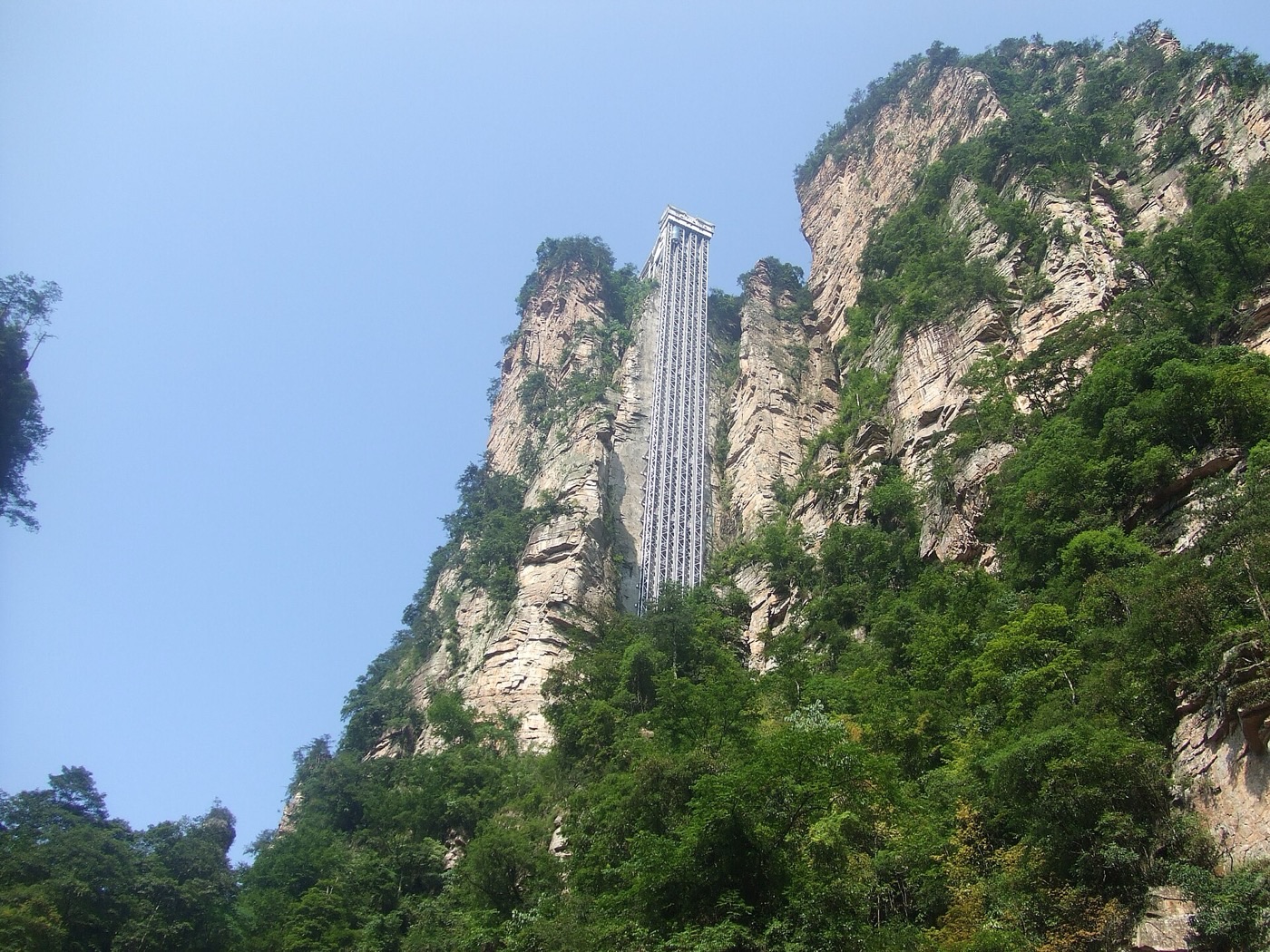 The Bailong Elevator, a glass observation lift built onto a sandstone cliff face in Wulingyuan